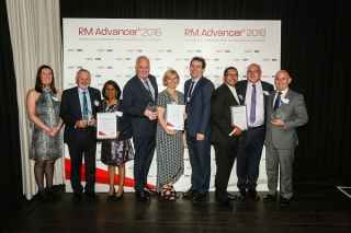 RM Advancer winners displaying their trophies