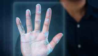 Hand on fingerprint touchpad
