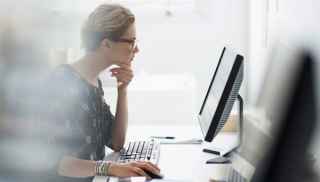 Woman at computer desk