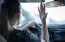 Road rage woman driving car