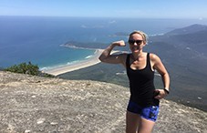 BDM spotlight Rachel on top of mountain overlooking ocean