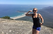 BDM spotlight Rachel on top of mountain overlooking ocean