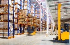Warehouse with boxes and forklift