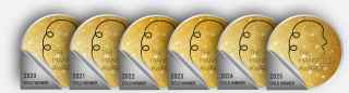 Six gold Manifest Awards coins with years 2020, 2021, 2022, 2023, 2024 and 2025 on silver sections.